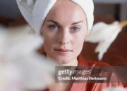 Dream Meaning of Red Bath Robe Placed On Someone